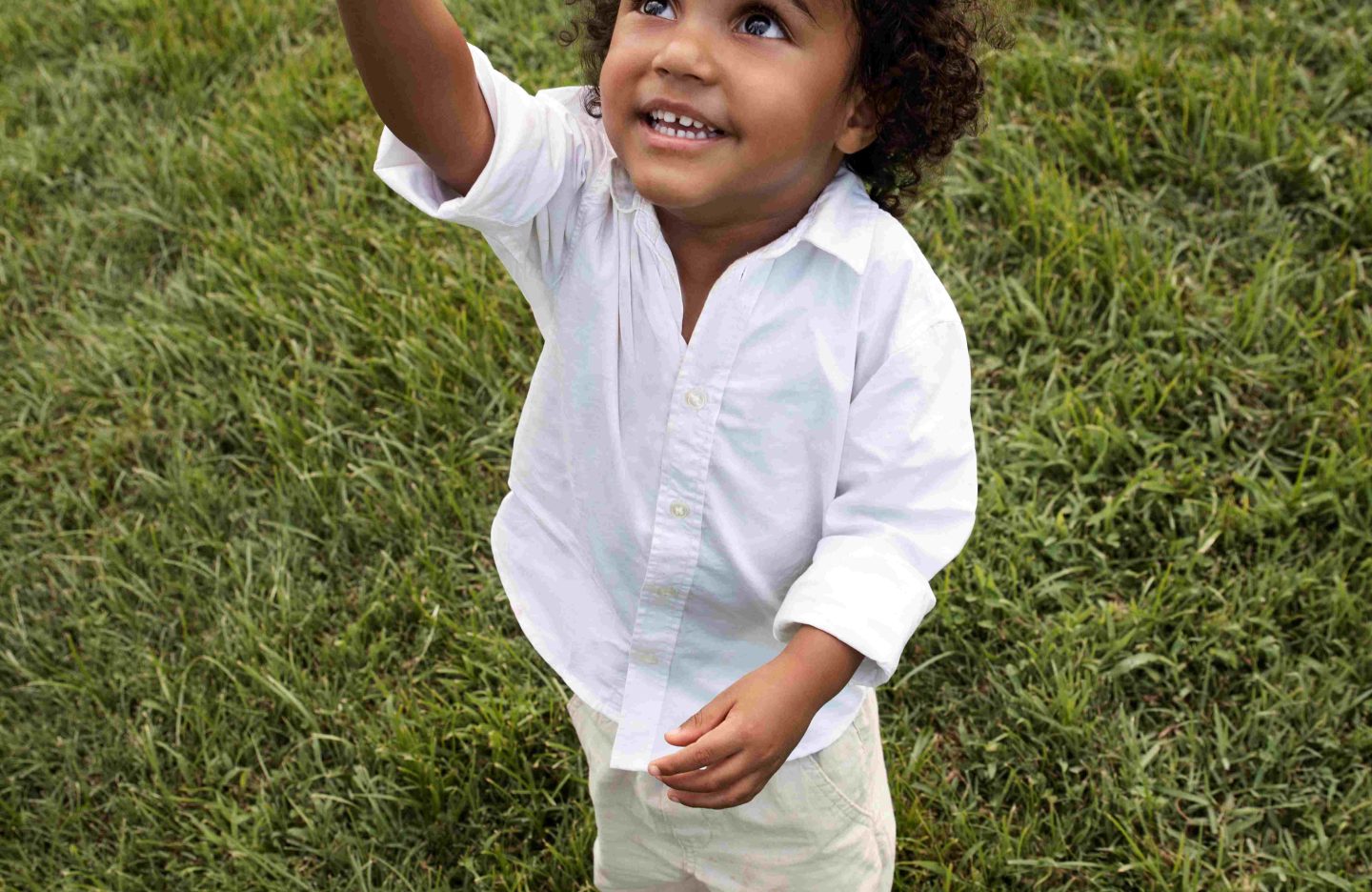 high-angle-smiley-kid-natural-location.jpg